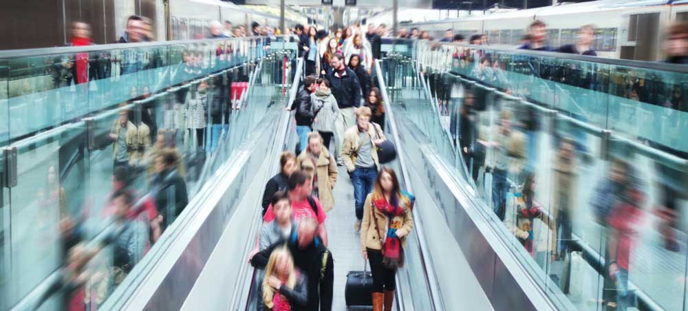 Flow-of-people-on-escelator-airport