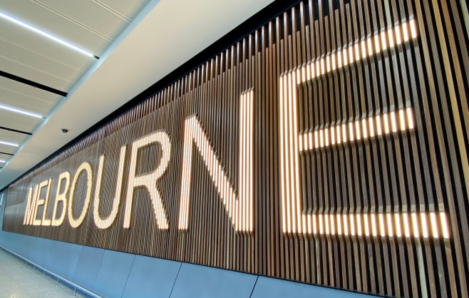 Sign inside Melbourne Airport with the text MELBOURNE